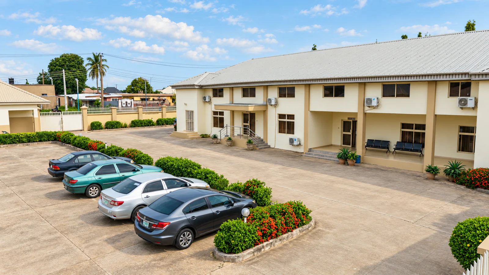 Conference buildings, landscaped courtyard and guest parking at HASKE Hotel Luxury