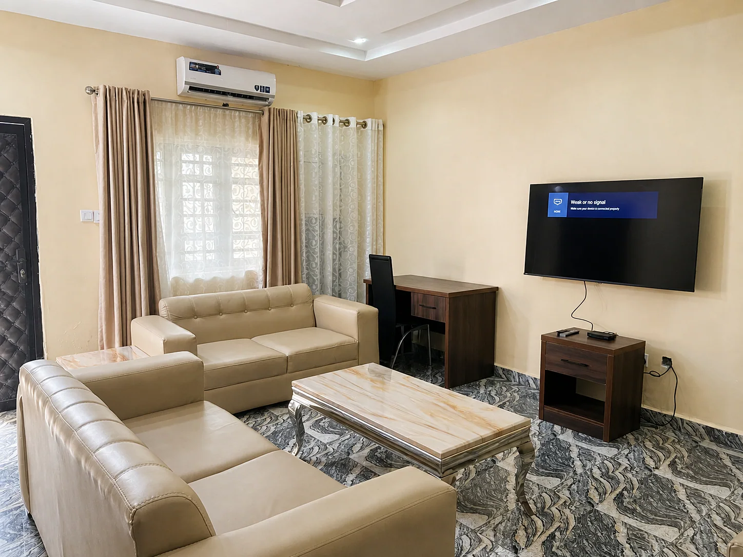 Living room in the Two Bedroom Suite at HASKE Hotel Apartments